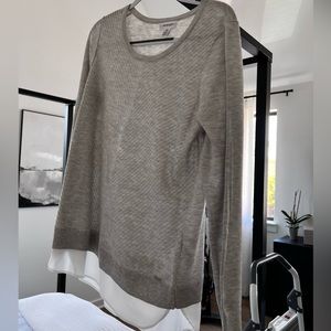 Sweater with sewn in blouse
